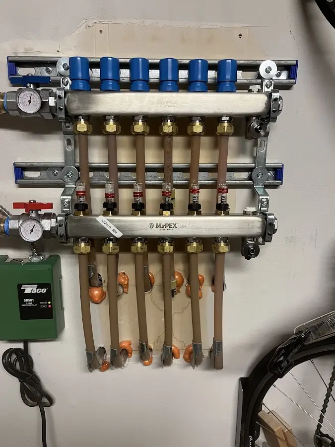 Plumber performing Gas Line Installation at a residential property in Sterling